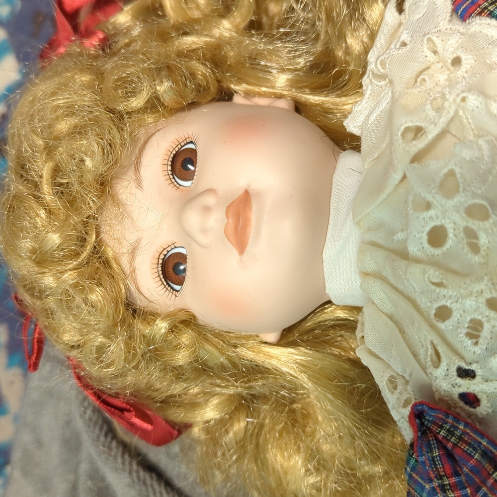 Well kept porcelain doll. Marsha